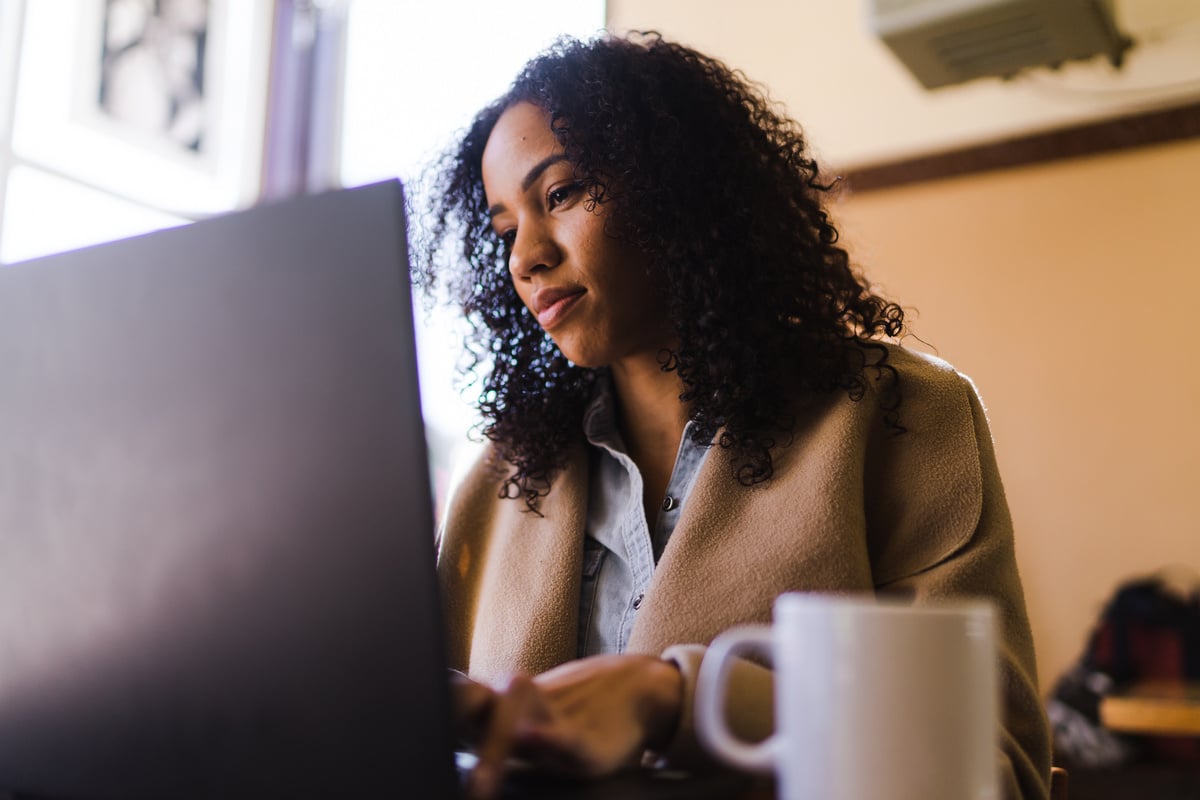 Woman Using Laptop Computer