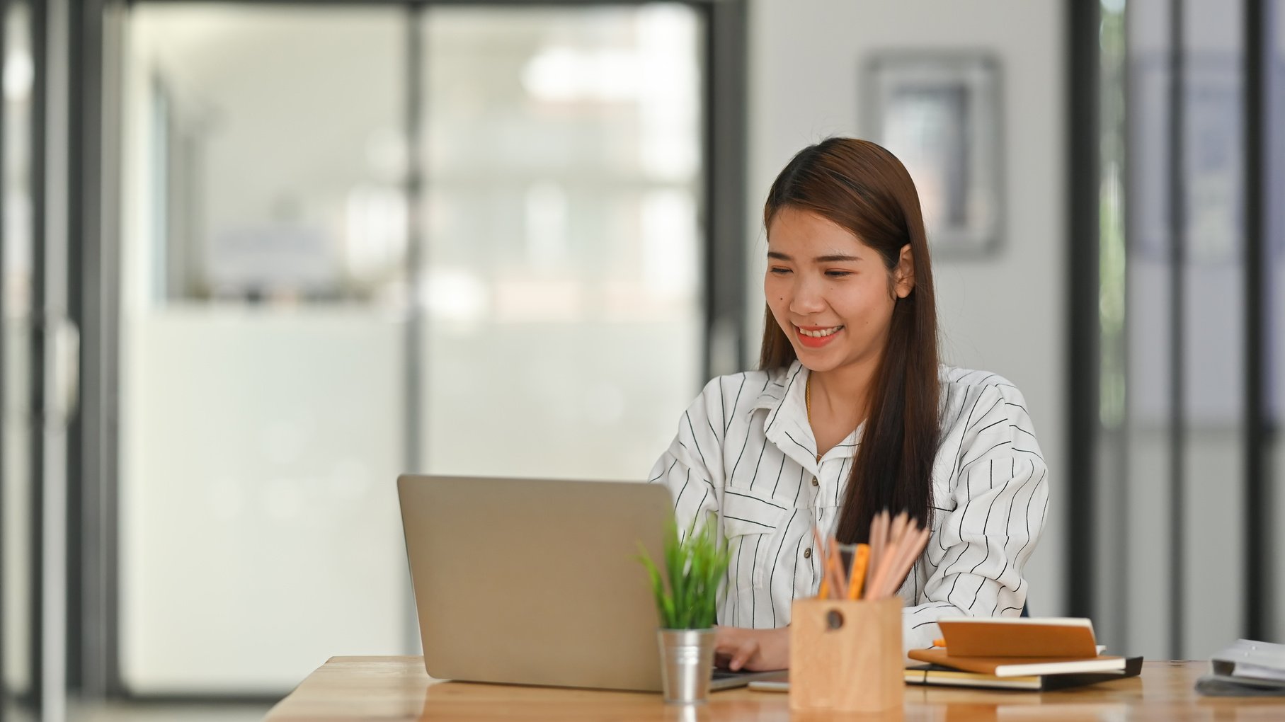 Female Employee Working in the Office 